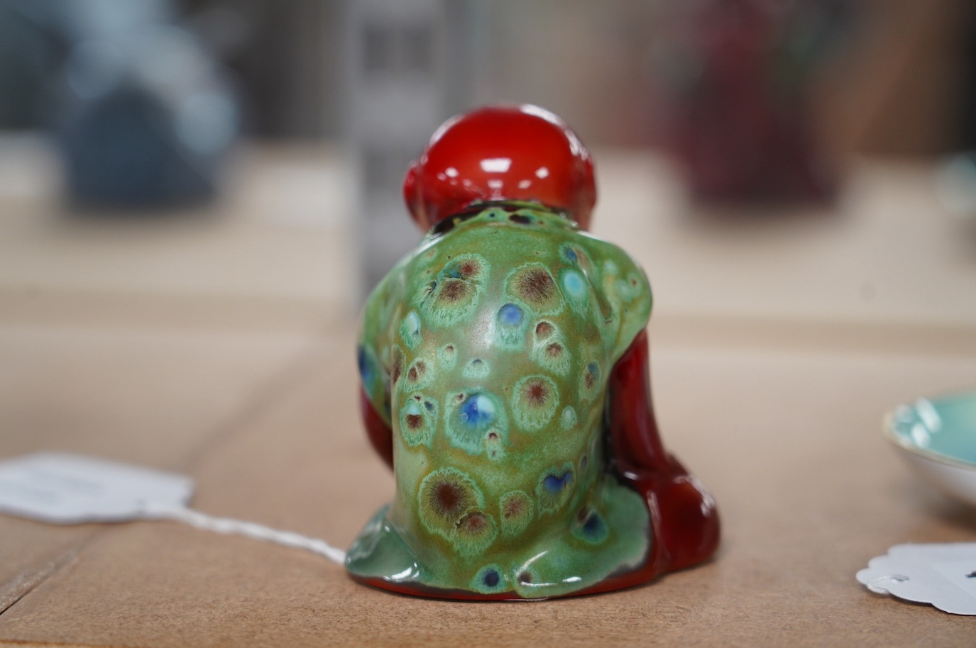 A Bernard Moore flambé monkey with crystalline glaze, c.1910, inset glass eyes, signed, 8cm high. Condition - good